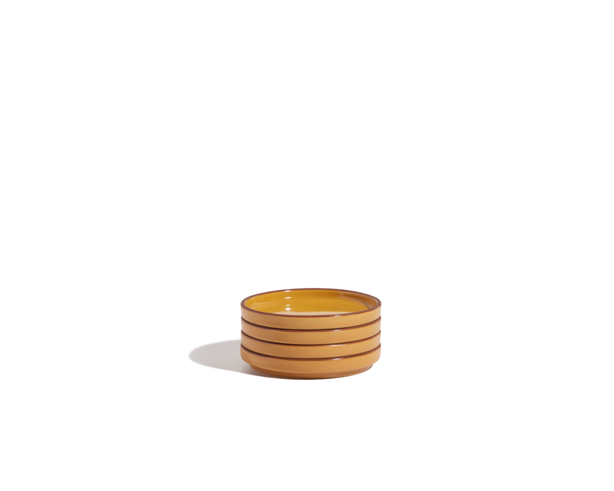 Tiny Plates: A small, round, yellow ceramic bowl with brown horizontal stripes, ideal for complementing any tableware set. Shown on a plain white background.