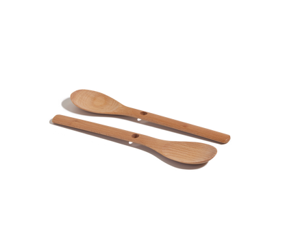 Two Beechwood Spoons with handle holes are shown on a plain white background, making them versatile, natural kitchen utensils for everyday use.