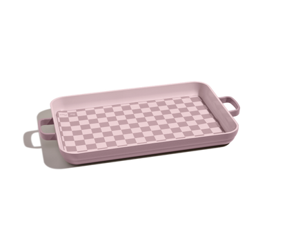 Rectangular pink tray with side handles and a checkered base, featured as part of the Bakeware Set, shown on a white background.