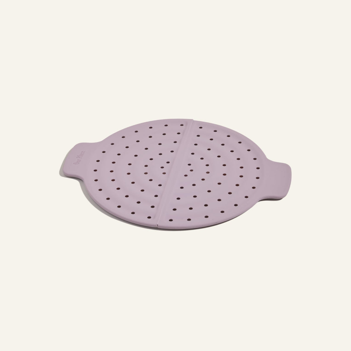 The Fearless Fry is a round, light purple silicone steamer lid with side handles and perforations, designed for the Always Pan to prevent splatter, shown on a plain light background.