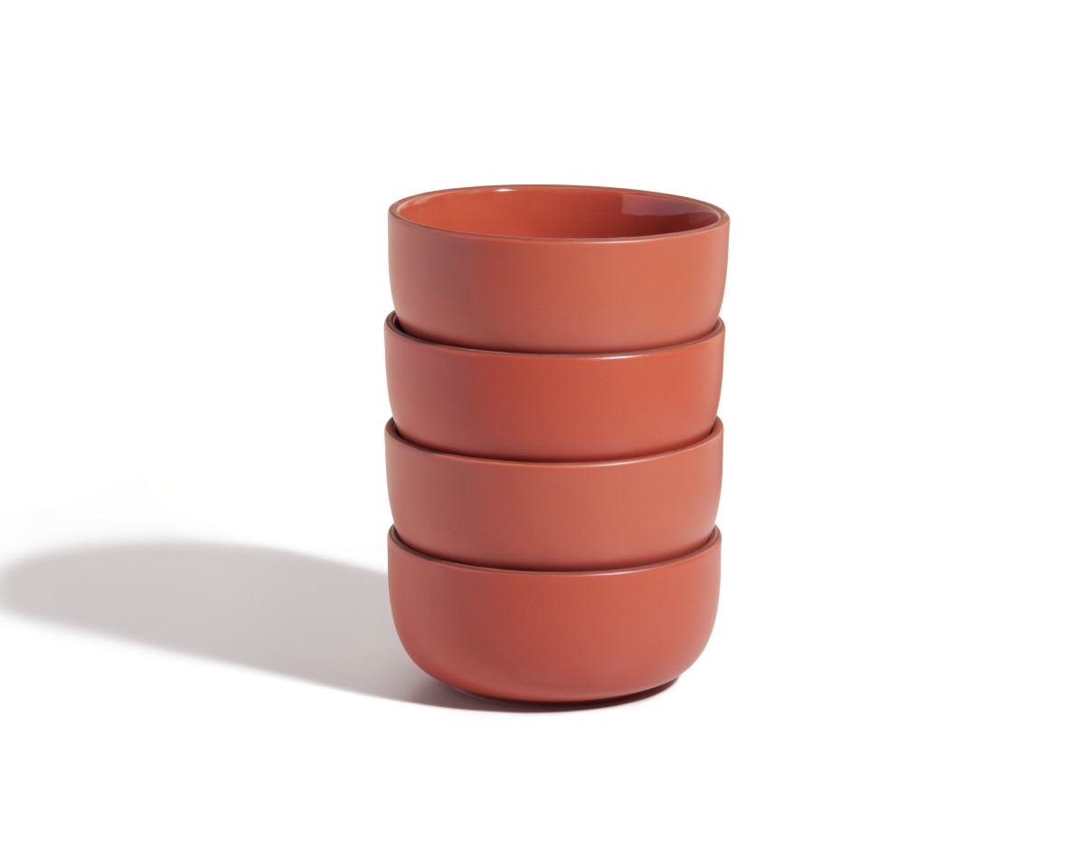 A set of four matte reddish-brown stackable Soup Bowls on a white background, ideal for enhancing your tableware collection.