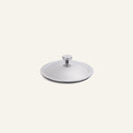 Round stainless steel Titanium Pro Lid (Mini) with a small knob handle.