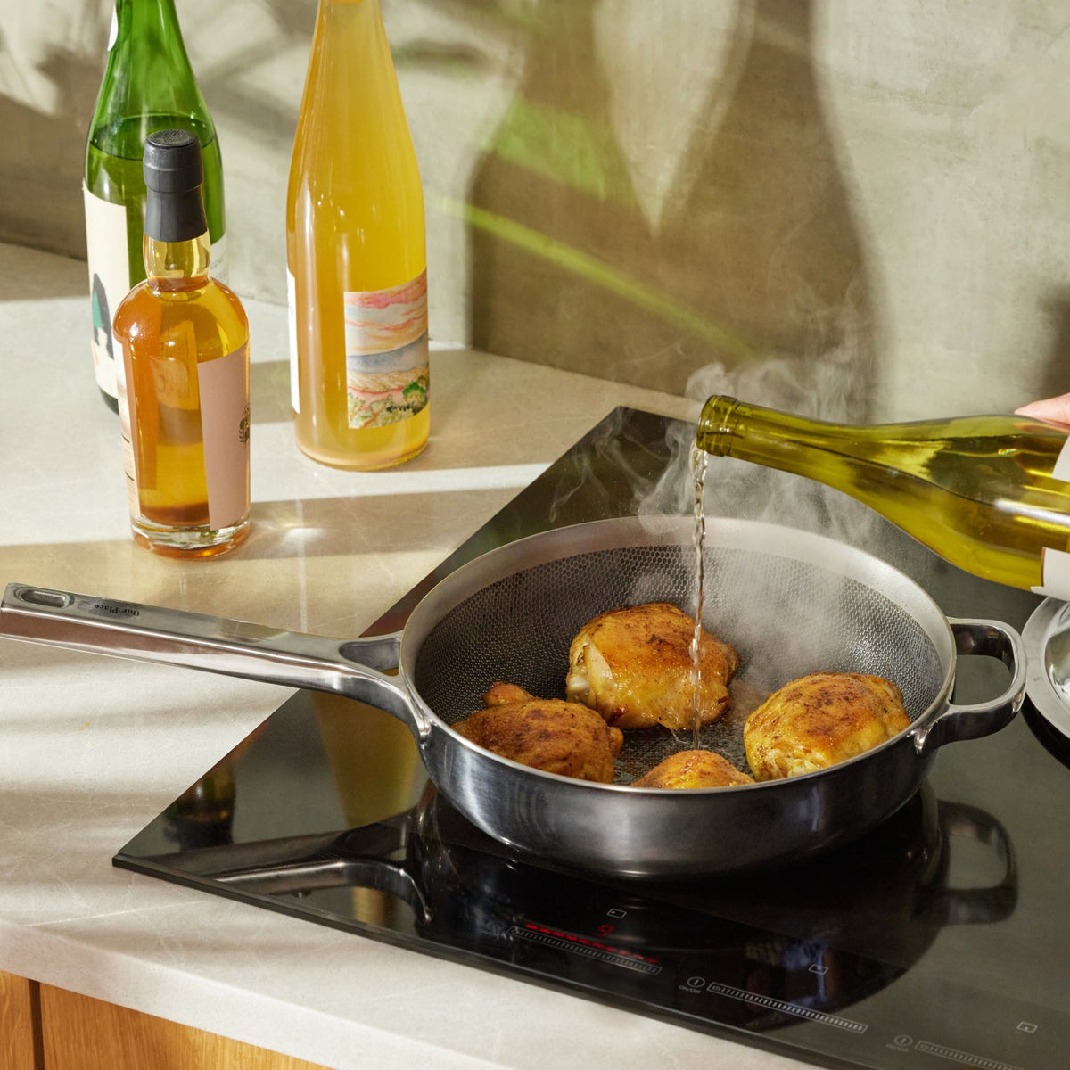 deglazing chrome titanium always pan pro non toxic frying pan with wine while cooking chicken on stove