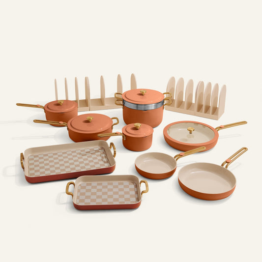 Set of ceramic cookware with checkered patterns on a white background