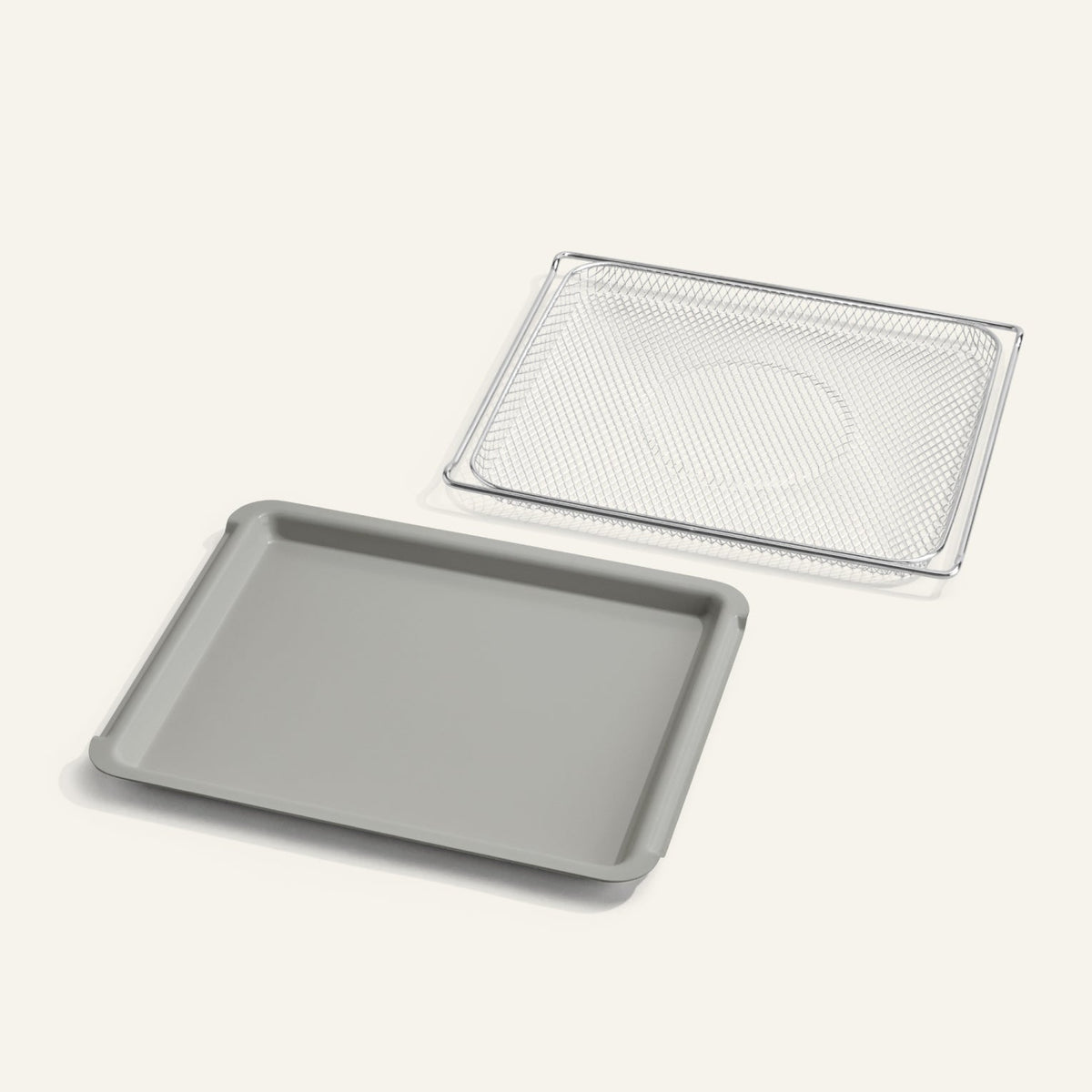Baking tray with a mesh rack on a white background