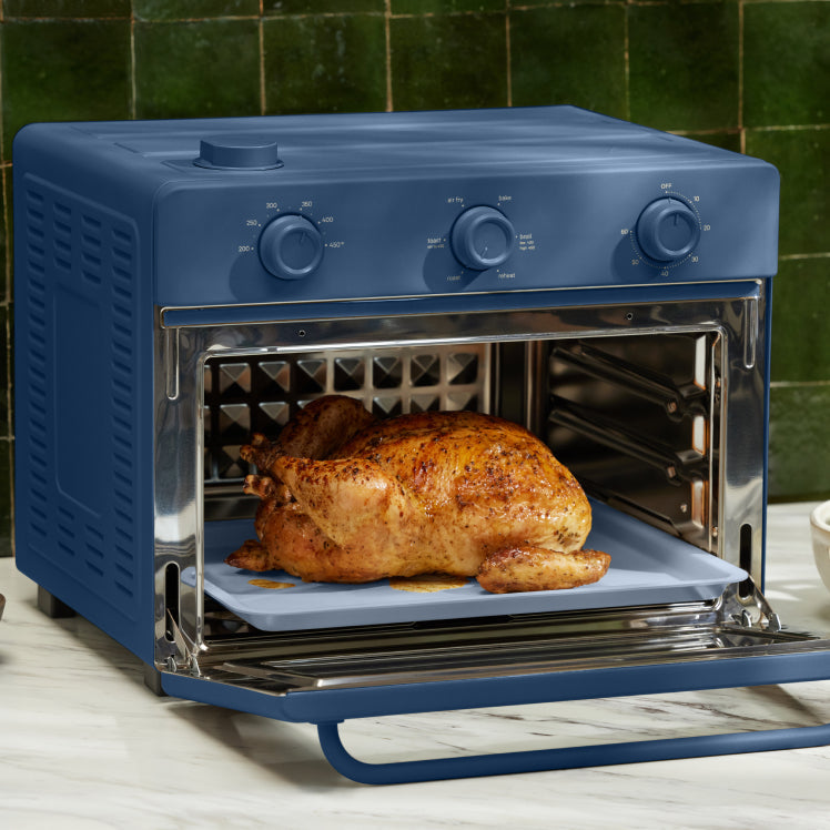 baking chicken in blue large wonder oven non toxic air fryer toaster oven on counter